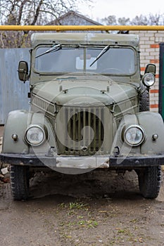 Tetyushy, Tatarstan/ Russia - May 02, 2019: Retro car GAZ-69 near the house in the street. Old vintage car GAZ-69 is a four-wheel