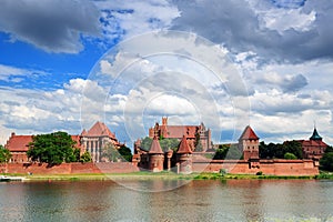 Teutonic Knights in Malbork castle in summer