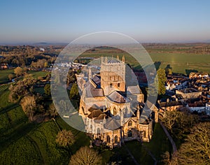 Tewkesbury Abbey drone point of view aerial photograph at sunrise.