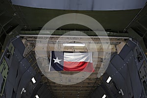 Texas flag in the military cargo airplane and aircraft.