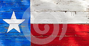 Texas flag painted on rustic weathered wooden boards
