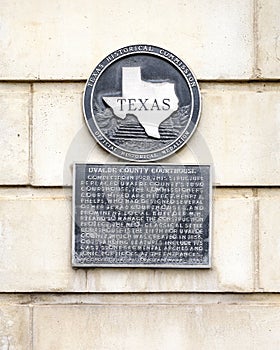 Texas Historical Commission Official Historical Medallion for the Uvalde County Courthouse in downtown Uvalde, Texas.