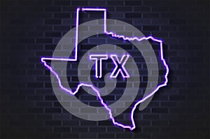 Texas map glowing neon lamp or glass tube on a black brick wall