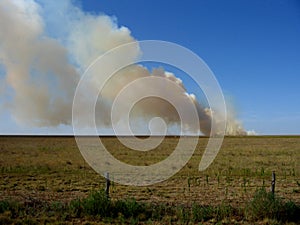 Texas Panhandle out of control wildfire burning on ranch photo
