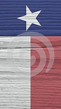 Texas state flag on dry wooden surface with pale, faded colors. Mobile phone wallpaper made of old wood. Vertical background. The