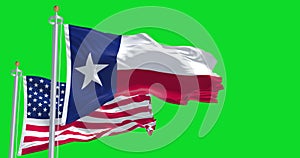 The Texas state flag waving along with the national flag of the United States of America