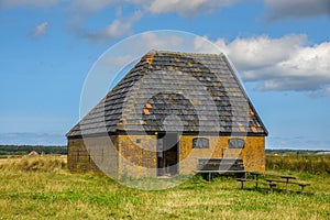 Texel, the Netherlands, August 2021. Autenthic barn for sheep on the isle of Texel.