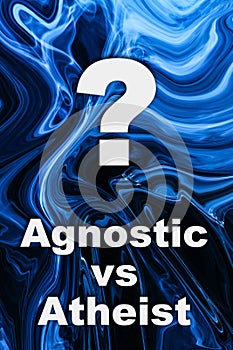 Text Agnostic Vs Atheist and question mark on stained blue background photo