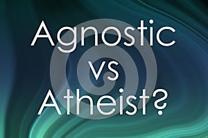 Text Agnostic Vs Atheist and question mark on stained color background photo