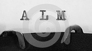 text ALM that means All Lives Matter on the typewriter