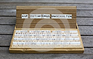 Text: Auf Optimismus umschalten