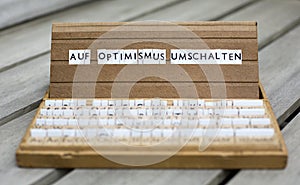 Text: Auf Optimismus umschalten