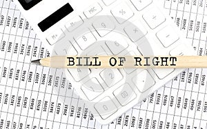 Text BILL OF RIGHTS on the wooden pencil on the calculator with chart