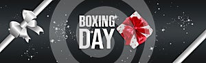 Text Boxing Day and gift on background with ribbon. Banner design