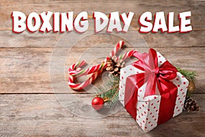 Text Boxing Day Sale and Christmas gift on table