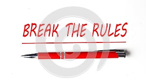 Text BREAK THE RULES with ped pen on the white background