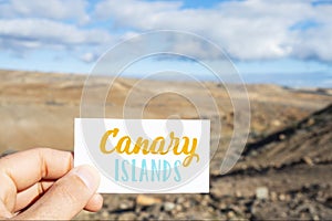 Text Canary Islands in signboard in dry landscape