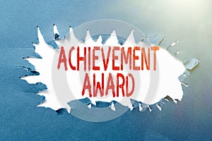 Text caption presenting Achievement Award. Word for recognizes worthy and outstanding achievement in job skill Thinking