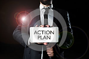 Text caption presenting Action Plan. Concept meaning list of things or schedule to be made thia current year Businessman