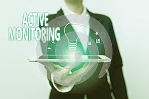 Text caption presenting Active Monitoring. Concept meaning person incharge go out and check workplace conditions Lady In