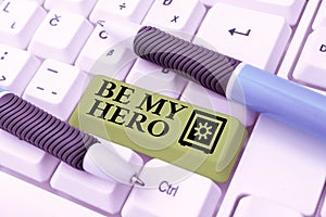 Text caption presenting Be My Hero. Business idea Request by someone to get some efforts of heroic actions for him