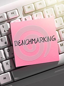 Text caption presenting Benchmarking. Concept meaning Evaluate something by comparison with a standard Strategy