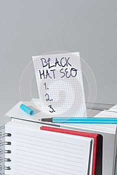 Text caption presenting Black Hat Seo. Conceptual photo Search Engine Optimization using techniques to cheat browsers