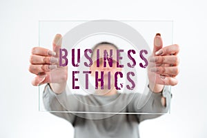Text caption presenting Business Ethics. Word for appropriate policies which govern how a business operates