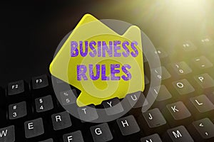 Text caption presenting Business Rules. Business concept a specific directive that constrains or defines a business