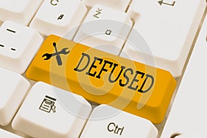 Text caption presenting Defused. Business approach make a difficult or dangerous situation calmer by reducing its cause