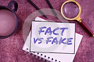 Text caption presenting Fact Vs Fake. Business overview Rivalry or products or information originaly made or imitation photo