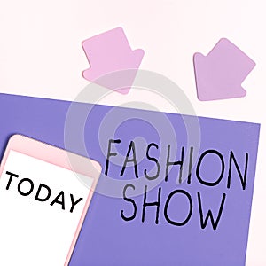 Text caption presenting Fashion Show. Word Written on exibition that involves styles of clothing and appearance