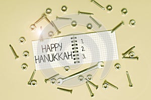 Text caption presenting Happy Hanukkah. Conceptual photo a day related with scary aspect, haunted house, and a candy