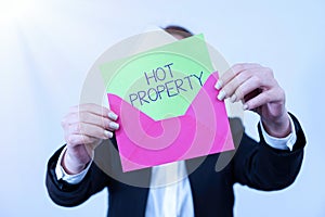 Text caption presenting Hot Property. Business overview Something which is sought after or is Heavily Demanded