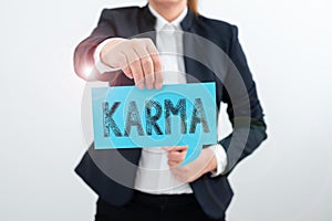 Text caption presenting Karma. Business approach sum of a person actions in this and previous states of existence