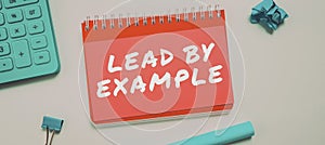 Text caption presenting Lead By Example. Concept meaning Leadership Management Mentor Organization