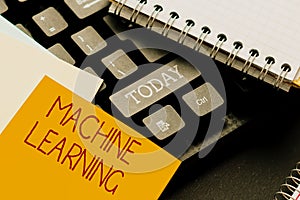 Text caption presenting Machine Learning. Word Written on the concept that a computer can learn new data itself Typing