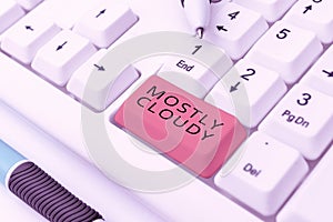 Text caption presenting Mostly Cloudy. Word for Shadowy Vaporous Foggy Fluffy Nebulous Clouds Skyscape
