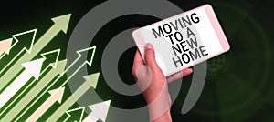 Text caption presenting Moving To A New Home. Conceptual photo help moves the possessions from one site to another