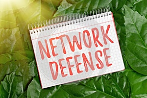 Text caption presenting Network Defense. Word Written on easures to protect and defend information from disruption