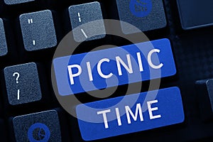 Text caption presenting Picnic Time. Business overview period where meal taken outdoors as part of an excursion