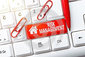 Text caption presenting Risk Management. Business overview evaluation of financial hazards or problems with procedures