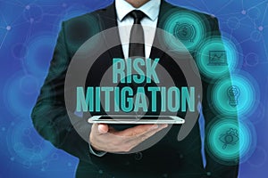 Text caption presenting Risk Mitigation. Business concept strategy to prepare for and lessen the effects of threats Man