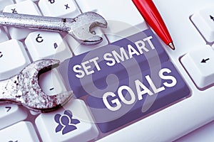 Text caption presenting Set Smart Goals. Word for Establish achievable objectives Make good business plans