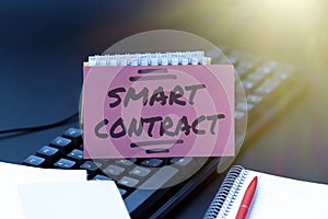 Text caption presenting Smart Contract. Business approach digital agreement to control the transfer of digital