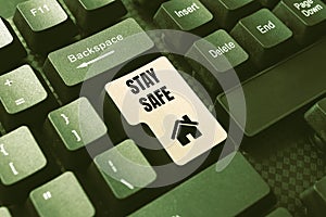 Text caption presenting Stay Safe. Business overview secure from threat of danger, harm or place to keep articles