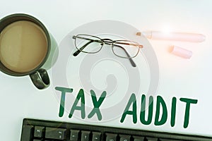 Text caption presenting Tax Audit. Concept meaning examination or verification of a business or individual tax return