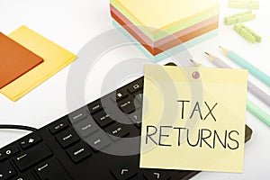 Text caption presenting Tax Returns. Business approach Tax payer financial information Tax Liability and Payment report