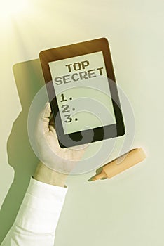 Text caption presenting Top Secret. Business showcase telling someone important data or information that he cant tell