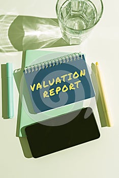 Text caption presenting Valuation Report. Conceptual photo process of converting an idea into a video Filmaking Typing photo